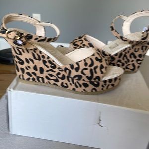 Women’s leopard 8.5 new wedges.brand new never worn.